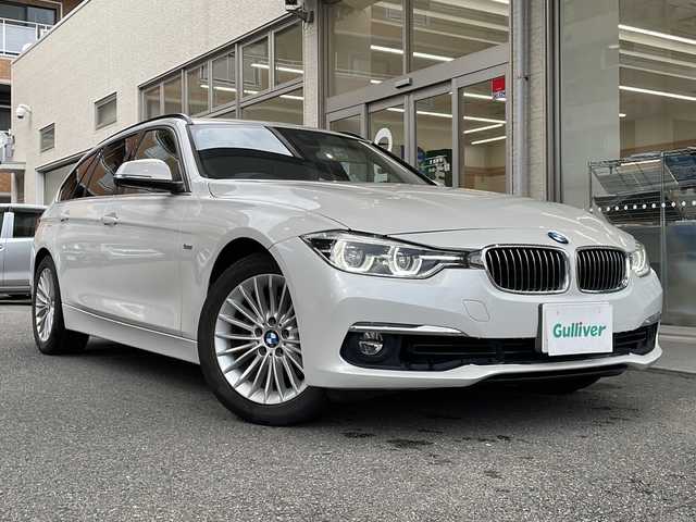 ＢＭＷ ３１８ｉ ツーリング ラグジュアリー 高知県 2017(平29)年 6.5万km ミネラルホワイト 純正ナビ/・Ｂｌｕｅｔｏｏｔｈ/・ＣＤ／ＤＶＤ/バックモニター/ＥＴＣ/茶色レザーシート/パワーシート/シートヒーター/プッシュスタート/スペアキー/LEDヘッドライト