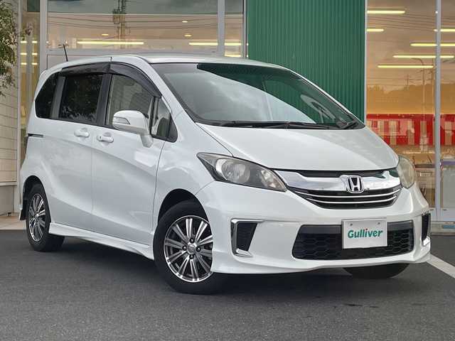 ホンダ フリード Gエアロ 岡山県 2015(平27)年 8.5万km ホワイトオーキッドパール 純正ナビ　/VXM-155VFi/フルセグTV、CD、DVD、Bluetooth、AM、FM/バックカメラ/ETC/片側パワースライドドア/スマートキー/オートライト/ドアバイザー/ハーフレザーシート