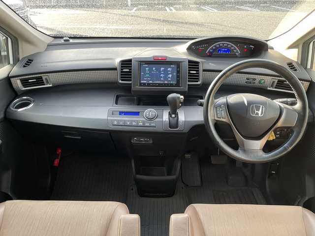 ホンダ フリード Gエアロ 岡山県 2015(平27)年 8.5万km ホワイトオーキッドパール 純正ナビ　/VXM-155VFi/フルセグTV、CD、DVD、Bluetooth、AM、FM/バックカメラ/ETC/片側パワースライドドア/スマートキー/オートライト/ドアバイザー/ハーフレザーシート