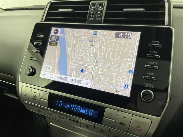 トヨタ ランドクルーザー プラド TX Lパッケージ 福井県 2023(令5)年 1.8万km ホワイトパールクリスタルシャイン 純正ナビ機能付きディスプレイオーディオ/（FM/AM/Bluetooth/AppleCarPlay//AndroidAuto)/アラウンドビューモニター/モデリスタエアロ/サンルーフ/黒革シート /エアシート/社外フロアマット/純正アルミホイール/前後コーナーセンサ―/盗難防止装置/純正ビルトインETC