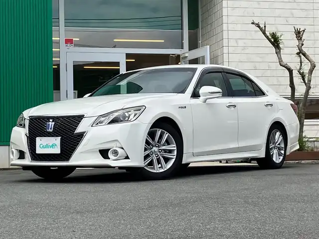 トヨタ クラウン ハイブリッド アスリートS 茨城県 2015(平27)年 5.2万km ホワイトパールクリスタルシャイン エンジンスタートボタン/パワーステアリング/パワーウィンドウ/保証書/取扱説明書/アイドリングストップ/スマートキー/オートエアコン/スペアキー/クルーズコントロール/純正ナビ（CD/BT/フルセグ）/バックカメラ/ETC/USB入力端子/純正フロアマット/純正アルミホイール/D席N席パワーシート/D席N席シートヒーター/ABS/横滑り防止装置/盗難防止装置/オートライト/W＋サイドエアバック/カーテンエアバック/ステアリングヒーター