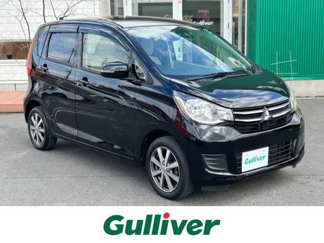 三菱 ｅＫワゴン G　セーフティPKG 青森県 2015(平27)年 7.2万km アメジストブラック 4WD/社外SDナビ/フルセグTV/CD/DVD/BT/SD/USB/全方位カメラ/e-アシスト/衝突軽減ブレーキ/横滑り防止機能/オートハイビーム/オートライト/運転席シートヒーター/ステアリングスイッチ/社外14インチアルミホイール/純正フロアマット