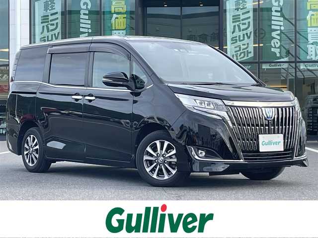 トヨタ エスクァイア ハイブリッド Gi プレミアムパッケージ ブラックテーラード 岡山県 2020(令2)年 3.7万km ブラック 登録時走行距離36784km/純正ナビ/フリップダウンモニター/両側パワースライドドア/デジタルインナーミラー/衝突軽減/レーンキープアシスト/オートハイビーム/ステアリングヒーター/シートヒーター/バックカメラ/ＬＥＤ/ETC2.0