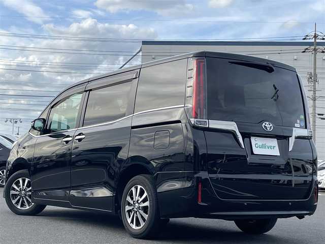 トヨタ エスクァイア ハイブリッド Gi プレミアムパッケージ ブラックテーラード 岡山県 2020(令2)年 3.7万km ブラック 登録時走行距離36784km/純正ナビ/フリップダウンモニター/両側パワースライドドア/デジタルインナーミラー/衝突軽減/レーンキープアシスト/オートハイビーム/ステアリングヒーター/シートヒーター/バックカメラ/ＬＥＤ/ETC2.0