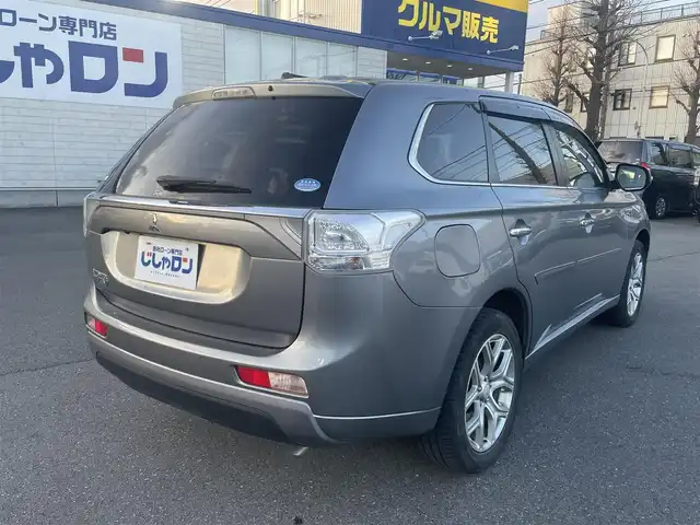 三菱 アウトランダー ＰＨＥＶ G ナビパッケージ 東京都 2013(平25)年 10.8万km ガンＭ (株)IDOMが運営する【じしゃロン昭島店】の自社ローン専用車両になります。/こちらは現金またはオートローンご利用時の価格です。/自社ローンご希望の方は別途その旨お申付け下さい/４WD/純正SDナビ/BT接続/TV/バックカメラ/ハーフレザー/パワーバックドア/レーダークルーズコントロール/スマートキー/プッシュスタート