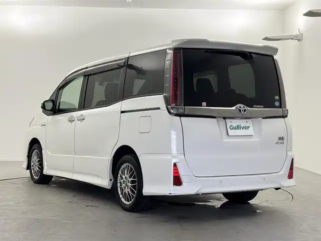 トヨタ ノア ハイブリッド Si ダブルバイビーⅡ 福井県 2020(令2)年 2万km ホワイトパールクリスタルシャイン トヨタセーフティーセンス/・プリクラッシュセーフティ/・レーンディパーチャーアラート/・オートハイビーム/クルーズコントロール/純正10インチナビ/・CD.DVD.SD.BT/フルセグTV/バックモニター/ハーフレザーシート/・前席シートヒーター/LEDヘッドライト/フォグランプ/アイドリングストップ/横滑り防止装置/ビルトインETC/ステアリングスイッチ/プッシュスタート/スマートキー/純正16インチアルミホイール/純正フロアマット/後席ロールサンシェード/シートバックテーブル