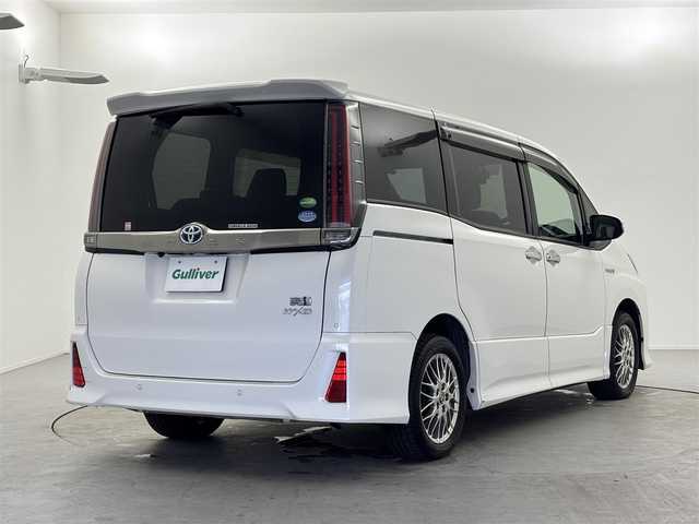 トヨタ ノア ハイブリッド Si ダブルバイビーⅡ 福井県 2020(令2)年 2万km ホワイトパールクリスタルシャイン トヨタセーフティーセンス/・プリクラッシュセーフティ/・レーンディパーチャーアラート/・オートハイビーム/クルーズコントロール/純正10インチナビ/・CD.DVD.SD.BT/フルセグTV/バックモニター/ハーフレザーシート/・前席シートヒーター/LEDヘッドライト/フォグランプ/アイドリングストップ/横滑り防止装置/ビルトインETC/ステアリングスイッチ/プッシュスタート/スマートキー/純正16インチアルミホイール/純正フロアマット/後席ロールサンシェード/シートバックテーブル