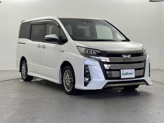 トヨタ ノア ハイブリッド Si ダブルバイビーⅡ 福井県 2020(令2)年 2万km ホワイトパールクリスタルシャイン トヨタセーフティーセンス/・プリクラッシュセーフティ/・レーンディパーチャーアラート/・オートハイビーム/クルーズコントロール/純正10インチナビ/・CD.DVD.SD.BT/フルセグTV/バックモニター/ハーフレザーシート/・前席シートヒーター/LEDヘッドライト/フォグランプ/アイドリングストップ/横滑り防止装置/ビルトインETC/ステアリングスイッチ/プッシュスタート/スマートキー/純正16インチアルミホイール/純正フロアマット/後席ロールサンシェード/シートバックテーブル
