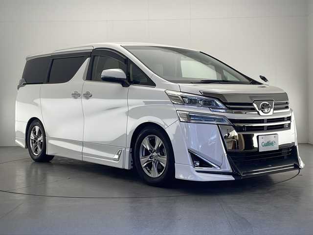 トヨタ ヴェルファイア X 宮崎県 2020(令2)年 6.7万km ホワイトパールクリスタルシャイン ワンオーナー/TRDスポイラー/Toyota Safety Sense/〇プリクラシュセーフティ/〇レーントレーシングアシスト/〇パーキングサポートブレーキ/〇クリアランスソナー/〇オートマチックハイビーム/〇レーダークルーズコントロール/〇先行車発進告知/純正9インチディスプレイオーディオ/フルセグTV/バックカメラ/純正12.1型後席モニター（V12T-R68C)/片側パワースライドドア/LEDヘッドライト/純正17インチAW/ビルトインETC/ドライブレコーダー/保証書/取扱説明書