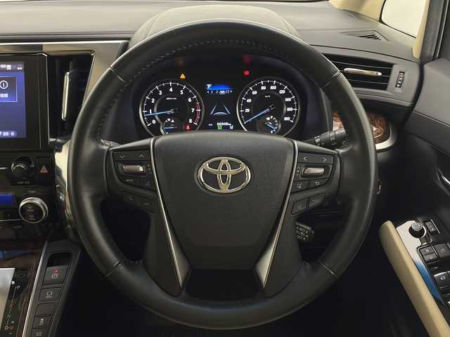 トヨタ ヴェルファイア X 宮崎県 2020(令2)年 6.7万km ホワイトパールクリスタルシャイン ワンオーナー/TRDスポイラー/Toyota Safety Sense/〇プリクラシュセーフティ/〇レーントレーシングアシスト/〇パーキングサポートブレーキ/〇クリアランスソナー/〇オートマチックハイビーム/〇レーダークルーズコントロール/〇先行車発進告知/純正9インチディスプレイオーディオ/フルセグTV/バックカメラ/純正12.1型後席モニター（V12T-R68C)/片側パワースライドドア/LEDヘッドライト/純正17インチAW/ビルトインETC/ドライブレコーダー/保証書/取扱説明書