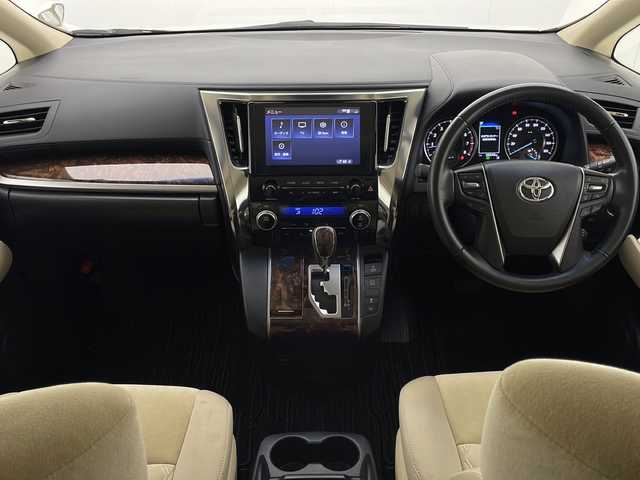 トヨタ ヴェルファイア X 宮崎県 2020(令2)年 6.7万km ホワイトパールクリスタルシャイン ワンオーナー/TRDスポイラー/Toyota Safety Sense/〇プリクラシュセーフティ/〇レーントレーシングアシスト/〇パーキングサポートブレーキ/〇クリアランスソナー/〇オートマチックハイビーム/〇レーダークルーズコントロール/〇先行車発進告知/純正9インチディスプレイオーディオ/フルセグTV/バックカメラ/純正12.1型後席モニター（V12T-R68C)/片側パワースライドドア/LEDヘッドライト/純正17インチAW/ビルトインETC/ドライブレコーダー/保証書/取扱説明書