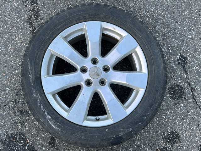 三菱 アウトランダー 24G 石川県 2009(平21)年 14.6万km クールシルバーメタリック 4WD/純正HDDナビゲーション/【FM/AM・CD/DVD】/・アナログTV/バックカメラ/アクティブスタビリティコントロール/ステアリングスイッチ/ステアリングリモコン/パドルシフト/オートライト/フォグランプ/電格ミラー/純正AWスタッドレスタイヤ車載/純正フロアマット/純正ドアバイザー