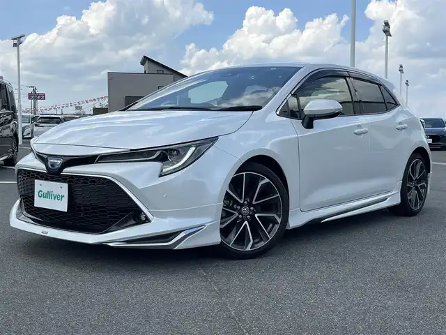 トヨタ カローラ スポーツ ハイブリッドG Z 奈良県 2022(令4)年 3.3万km プラチナホワイトパールマイカ モデリスタエアロ　/メーカーナビ　/(AppleCarPlay/BT/Miracast)/フルセグＴＶ　/バックカメラ　/レーダークルーズコントロール　/衝突被害軽減システム　/ハーフレザーシート　/前席シートヒーター /前後ドライブレコーダー /車線逸脱警報/LEDヘッドライト