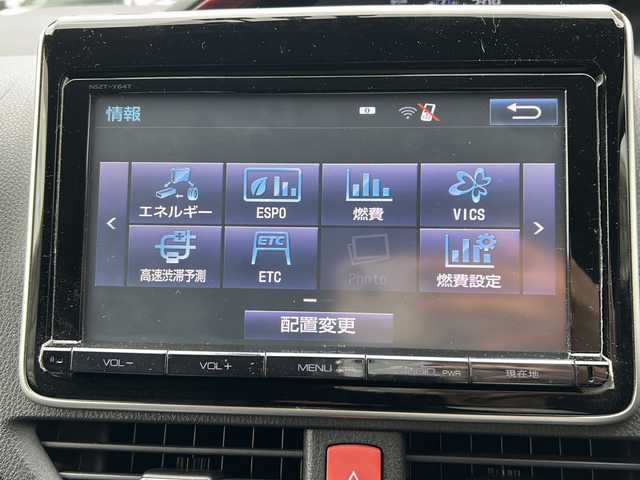 トヨタ ヴォクシー ハイブリッド V 愛知県 2015(平27)年 14.5万km ホワイトパールクリスタルシャイン ワンオーナー/置くだけ充電/モデリスタエアロ/革調シートカバー/純正SDナビ/フルセグTV・CD・DVD・SD・Bluetooth/バックカメラ/純正フリップダウンモニター/両側パワースライドドア/前席シートヒーター/LEDヘッドランプ/フォグランプ/ステアリングスイッチ/スマートキー/プッシュスタート/純正フロアマット/保証書/取扱説明書/スペアスマートキー