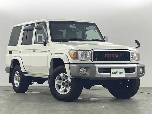 トヨタ ランドクルーザー 福島県 2015(平27)年 4万km ホワイト ０ｔｈアニバーサリー　/パートタイム４ＷＤ　/社外ナビ　/型番:AVIC-RW89/ＥＴＣ　/フェンダーミラー　/デフロック　/ハーフレザーシート　/純正フロアマット/取扱説明書　/・保証書　/ＨＩＤライト　/・フォグライト　/リモコンキー/・レベライザー/純正16INAW