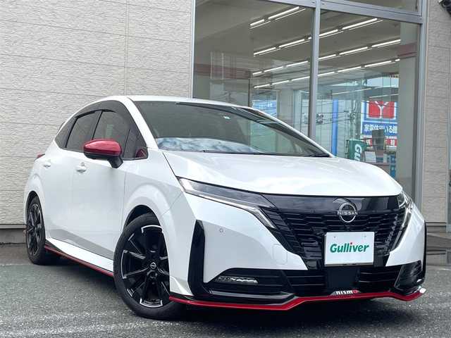 日産 オーラ ニスモ 埼玉県 2023(令5)年 1.4万km ピュアホワイトパール /ワンオーナー//純正メモリナビ//フルセグTV//全方位カメラ//プロパイロット//クルーズコントロール//ビルトインETC2.0//スマートキー×2//LEDヘッドライト//前2席シートヒーター//ステアリングヒーター//エマージェンシーブレーキ//ハンドル支援//側方支援/後側方支援//クリアランスソナー//W.サイドエアバッグ//カーテン.ニーエアバッグ//ABS/横滑り防止装置//インテリジェントルームミラー//ドライブレコーダー//前後LEDフォグ//革巻きステアリング//オートライト//プライバシーガラス//ドアバイザー//純正17インチAW//新車時保証書//取扱説明書//ナビ取説
