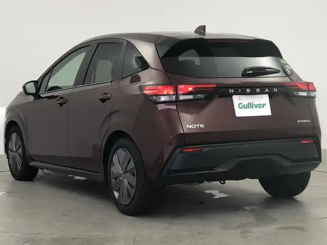 日産 ノート X 愛知県 2021(令3)年 4.5万km バーガンディー 純正9インチワイドディスプレイオーディオ/フルセグTV/USBポート/ドライブレコーダー/デジタルインナーミラー/ワイヤレス充電器/ステアリングリモコン/プロパイロット/インテリジェントエマージェンシーブレーキ/踏み間違い衝突防止アシスト/車線逸脱警報/ビークルダイナミクスコントロール/全方位運転支援システム/レーダークルーズコントロール/BSM/ビルトインETC/取扱説明書/スマートキー
