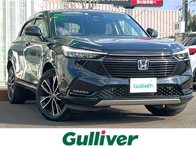 ホンダ ヴェゼル ハイブリッド e:HEV Z 道央・札幌 2021(令3)年 2.4万km クリスタルブラックパール ・４WD/・ホンダセンシング/・寒冷地仕様/・純正ディスプレイオーディオ/　BT＆USB＆TV/・バックカメラ/・ハーフレザーシート/・パワーバックドア/・置くだけ充電/・コーナーセンサー/・レーンキープアシスト/・レーダークルーズコントロール/・ワイパ熱線/・ブラインドスポットモニター/・オートエアコン/・オートライト/・ミラーヒーター/・ステアリングヒーター/・オートリトラミラー/・プッシュスタート/・スマートキー/・パドルシフト/・レインセンサーワイパー/・ドライブレコーダー/・純正フロアマット/・ドアバイザー/・ウィンカーミラー/・フォグライト