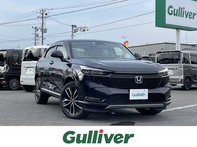 ホンダ ヴェゼル ハイブリッド e:HEV Z 青森県 2021(令3)年 2.4万km クリスタルブラックパール ・４WD/・ホンダセンシング/・寒冷地仕様/・純正ディスプレイオーディオ/　BT＆USB＆TV/・バックカメラ/・ハーフレザーシート/・パワーバックドア/・置くだけ充電/・コーナーセンサー/・レーンキープアシスト/・レーダークルーズコントロール/・ワイパ熱線/・ブラインドスポットモニター/・オートエアコン/・オートライト/・ミラーヒーター/・プッシュスタート/・スマートキー/・パドルシフト/・ドライブレコーダー/・純正フロアマット/・ウィンカーミラー/・フォグライト