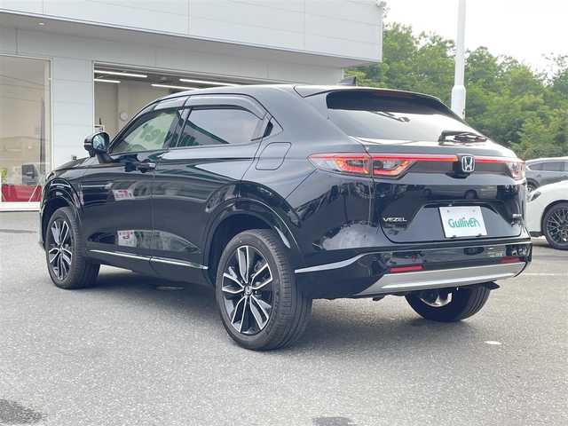 ホンダ ヴェゼル ハイブリッド e:HEV Z 青森県 2021(令3)年 2.4万km クリスタルブラックパール ・４WD/・ホンダセンシング/・寒冷地仕様/・純正ディスプレイオーディオ/　BT＆USB＆TV/・バックカメラ/・ハーフレザーシート/・パワーバックドア/・置くだけ充電/・コーナーセンサー/・レーンキープアシスト/・レーダークルーズコントロール/・ワイパ熱線/・ブラインドスポットモニター/・オートエアコン/・オートライト/・ミラーヒーター/・プッシュスタート/・スマートキー/・パドルシフト/・ドライブレコーダー/・純正フロアマット/・ウィンカーミラー/・フォグライト
