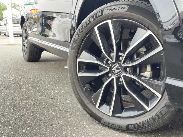 ホンダ ヴェゼル ハイブリッド e:HEV Z 青森県 2021(令3)年 2.4万km クリスタルブラックパール ・４WD/・ホンダセンシング/・寒冷地仕様/・純正ディスプレイオーディオ/　BT＆USB＆TV/・バックカメラ/・ハーフレザーシート/・パワーバックドア/・置くだけ充電/・コーナーセンサー/・レーンキープアシスト/・レーダークルーズコントロール/・ワイパ熱線/・ブラインドスポットモニター/・オートエアコン/・オートライト/・ミラーヒーター/・プッシュスタート/・スマートキー/・パドルシフト/・ドライブレコーダー/・純正フロアマット/・ウィンカーミラー/・フォグライト