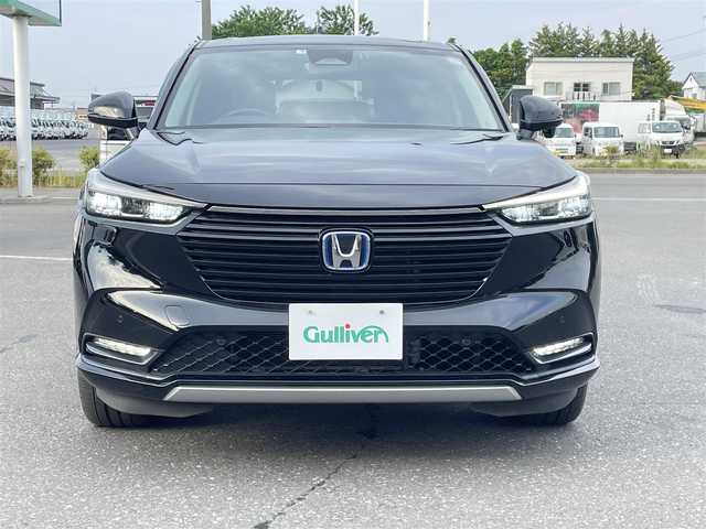 ホンダ ヴェゼル ハイブリッド e:HEV Z 青森県 2021(令3)年 2.4万km クリスタルブラックパール ・４WD/・ホンダセンシング/・寒冷地仕様/・純正ディスプレイオーディオ/　BT＆USB＆TV/・バックカメラ/・ハーフレザーシート/・パワーバックドア/・置くだけ充電/・コーナーセンサー/・レーンキープアシスト/・レーダークルーズコントロール/・ワイパ熱線/・ブラインドスポットモニター/・オートエアコン/・オートライト/・ミラーヒーター/・プッシュスタート/・スマートキー/・パドルシフト/・ドライブレコーダー/・純正フロアマット/・ウィンカーミラー/・フォグライト