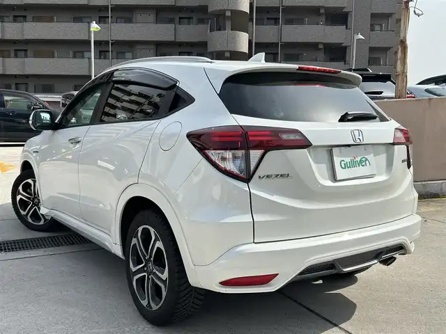 ホンダ ヴェゼル ハイブリッド Z 広島県 2015(平27)年 8.1万km ホワイトオーキッドパール 禁煙車/パドルシフト/純正17インチAW/純正SDナビ/(BT/DVD/CD/AUX/USB/iPod)/フルセグテレビ/バックカメラ/クルーズコントロール/プッシュスタート/オートライト/純正LEDヘッドライト/純正フロアマット/フォグランプ/スペアキー