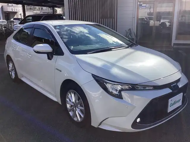 トヨタ カローラ ハイブリット S 鹿児島県 2020(令2)年 3.2万km ホワイトパールクリスタルシャイン ワンオーナー/禁煙車/プッシュスタート/純正ナビ/TV/バックカメラ/ビルトインETC/レーダーブレーキ/レーダークルーズコントロール/ブラインドスポットモニター/ドライブレコーダー/電動パーキング/レーンキープアシスト