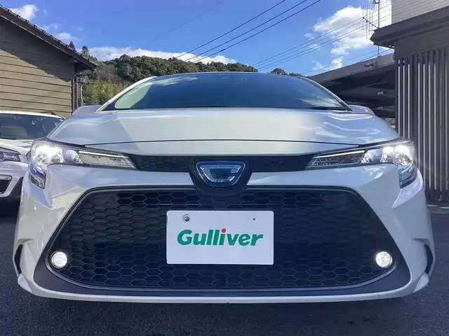 トヨタ カローラ ハイブリット S 鹿児島県 2020(令2)年 3.2万km ホワイトパールクリスタルシャイン ワンオーナー/禁煙車/プッシュスタート/純正ナビ/TV/バックカメラ/ビルトインETC/レーダーブレーキ/レーダークルーズコントロール/ブラインドスポットモニター/ドライブレコーダー/電動パーキング/レーンキープアシスト