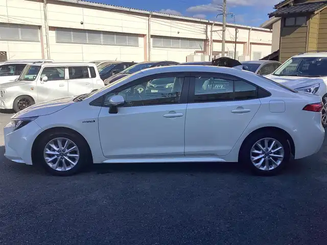 トヨタ カローラ ハイブリット S 鹿児島県 2020(令2)年 3.2万km ホワイトパールクリスタルシャイン ワンオーナー/禁煙車/プッシュスタート/純正ナビ/TV/バックカメラ/ビルトインETC/レーダーブレーキ/レーダークルーズコントロール/ブラインドスポットモニター/ドライブレコーダー/電動パーキング/レーンキープアシスト