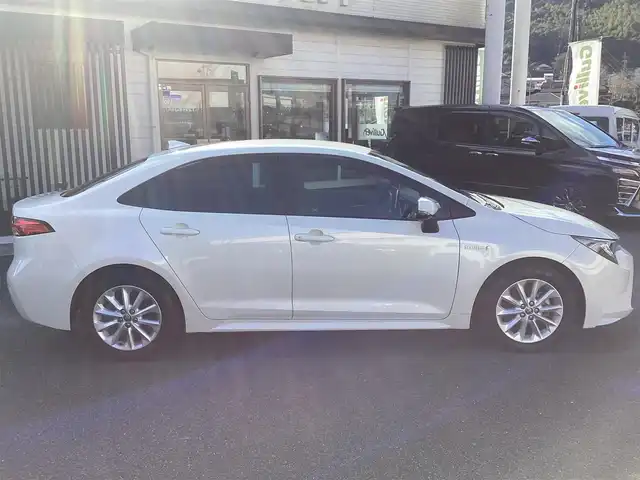 トヨタ カローラ ハイブリット S 鹿児島県 2020(令2)年 3.2万km ホワイトパールクリスタルシャイン ワンオーナー/禁煙車/プッシュスタート/純正ナビ/TV/バックカメラ/ビルトインETC/レーダーブレーキ/レーダークルーズコントロール/ブラインドスポットモニター/ドライブレコーダー/電動パーキング/レーンキープアシスト