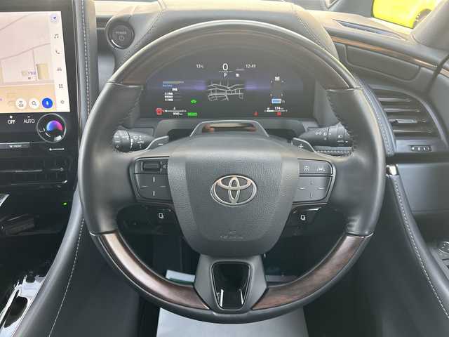 トヨタ アルファードハイブリット Z 東京都 2025(令7)年 1万km プラチナホワイトパールマイカ ワンオーナー/純正フルセグTVナビ/（Bluetooth/HDMI/Type-C/T-Connect）/JBLブレミアムサウンド/純正18インチアルミホイール/純正フロアマット/モデリスタフルエアロ/・フロントスポイラー/・サイドスカート/・リアスポイラー/・ディフーザー/アラウンドビューモニター/バックカメラ/ビルトインETC2.0/レザーシート/・パワーシート/・シートヒーター/・エアシート/デジタルインナーミラー/置くだけ充電/左右独立ムーンルーフ/ハンドルヒーター/追従型クルーズコントロール/パドルシフト/横滑り防止装置/コーナーセンサー（前後）/レーンキープアシスト/オートライト/オートマチックハイビーム/LEDヘッドライト/衝突被害軽減システム/スマートキー/スペアキー1本/保証書