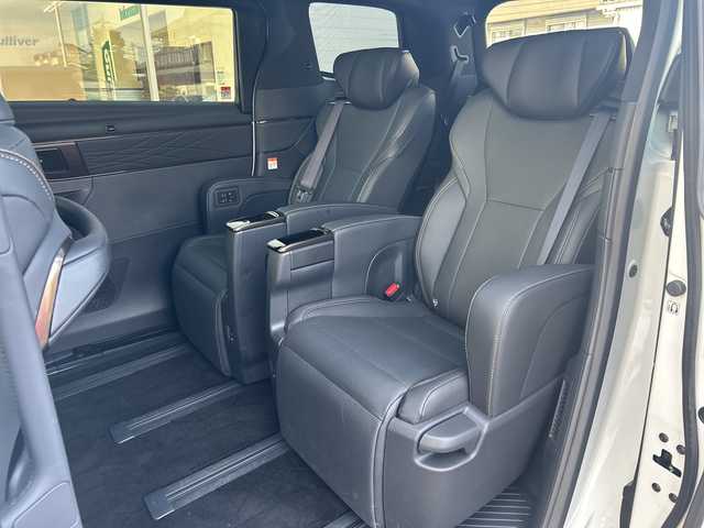 トヨタ アルファードハイブリット Z 東京都 2025(令7)年 1万km プラチナホワイトパールマイカ ワンオーナー/純正フルセグTVナビ/（Bluetooth/HDMI/Type-C/T-Connect）/JBLブレミアムサウンド/純正18インチアルミホイール/純正フロアマット/モデリスタフルエアロ/・フロントスポイラー/・サイドスカート/・リアスポイラー/・ディフーザー/アラウンドビューモニター/バックカメラ/ビルトインETC2.0/レザーシート/・パワーシート/・シートヒーター/・エアシート/デジタルインナーミラー/置くだけ充電/左右独立ムーンルーフ/ハンドルヒーター/追従型クルーズコントロール/パドルシフト/横滑り防止装置/コーナーセンサー（前後）/レーンキープアシスト/オートライト/オートマチックハイビーム/LEDヘッドライト/衝突被害軽減システム/スマートキー/スペアキー1本/保証書