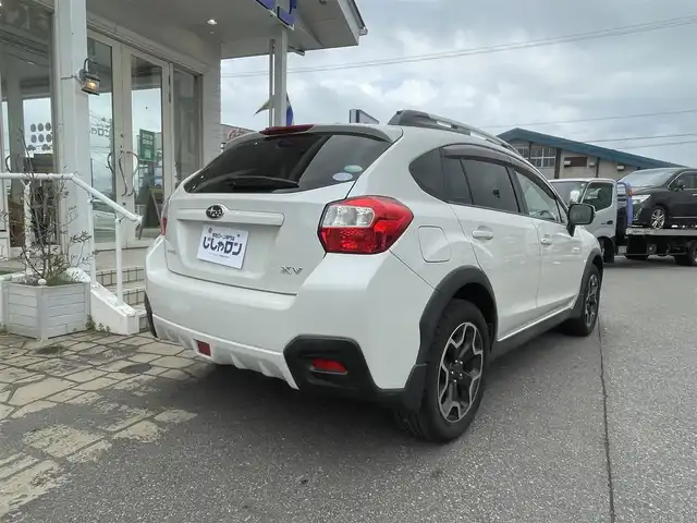 スバル インプレッサ ＸＶ 2．0i－L アイサイト 秋田県 2014(平26)年 9.4万km サテンホワイトパール (株)IDOMが運営する【じしゃロン 秋田店】の自社ローン専用車両になります。こちらは現金またはオートローンご利用時の価格です。自社ローンご希望の方は別途その旨お申付け下さい/４WD/スマートキー/社外ナビ/フルセグテレビ/ETC/アイサイト/パワーシート