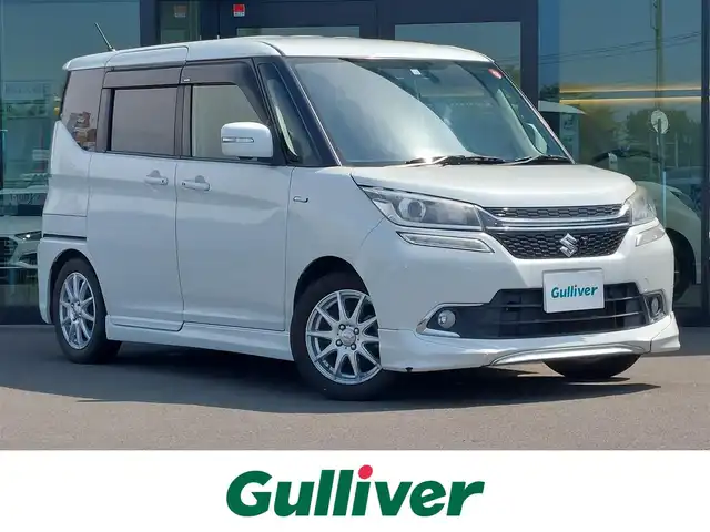 スズキ ソリオ バンディット HV MV Dカメラ ブレーキS 東京都 2016(平28)年 12.2万km ピュアホワイトP スズキセーフティサポート/・デュアルカメラブレーキサポート/・車線逸脱警報機能/・先行車発進お知らせ機能/・誤発進抑制機能/・クルーズコントロール/・全方位モニター/プッシュスタート/アイドリングストップ/純正ナビ/フルセグTV/ETC/両側パワースライドドア/シートヒーター/パーソナルテーブル/後席ロールサンシェード/LEDヘッドライト/オートライト/ドアバイザー/15インチ社外アルミホイール/純正アルミホイール付きスタッドレスタイヤ４本車載