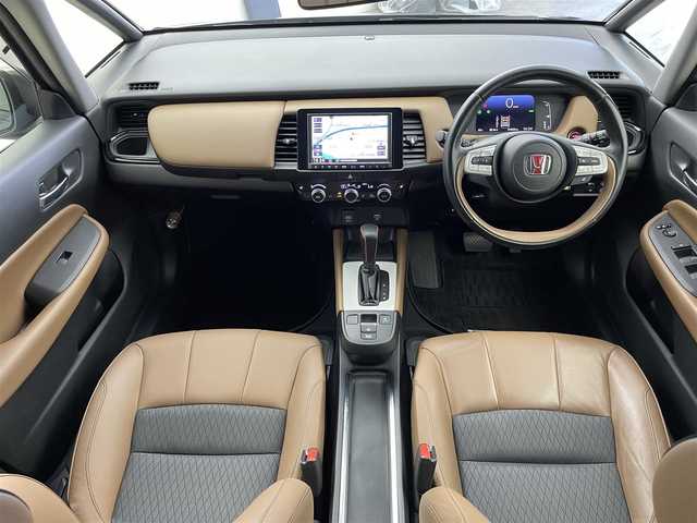 ホンダ フィット e:HEVリュクス 熊本県 2020(令2)年 3.3万km 茶 純正８インチナビ/バックカメラ/アダプティブクルーズコントロール/ドライブレコーダー/ETC/オートハイビーム/シートヒーター/レーンキープアシスト/BT接続/ワイパーデアイサー/盗難防止装置/横滑り防止装置/衝突被害軽減システム/ステアリングリモコン/SRSエアバック （運転席/助手席/サイド/カーテン）/本革シート/純正16インチアルミホイール/禁煙車