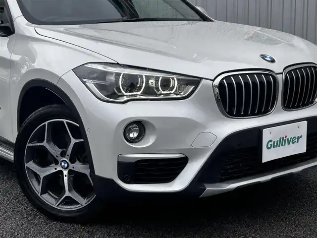 ＢＭＷ Ｘ１ xDrive 18d 静岡県 2017(平29)年 10.5万km ミネラルホワイト ユーザー買取車両/純正ナビ/　【CD/BT】/純正LEDヘッドライト/純正18インチAW/バックカメラ/アダクティブクルーズコントロール/ドライブレコーダー/茶レザーシート/シートヒーター/ミラー一体型ETC/スマートキー/プッシュスタート/新車時保証書/取扱説明書