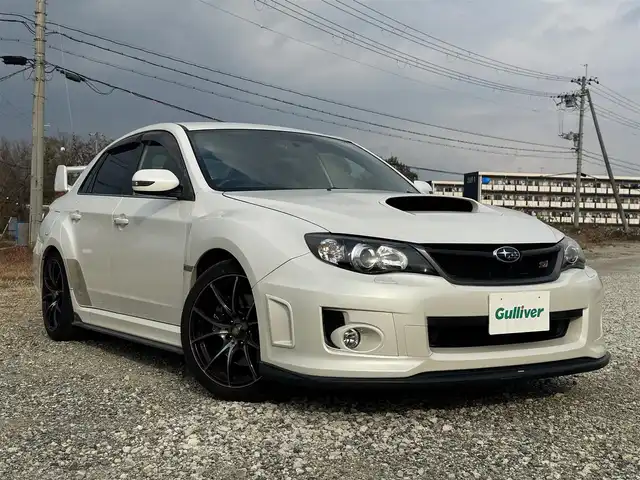 スバル インプレッサ ＷＲＸ STi 兵庫県 2014(平26)年 5.6万km サテンホワイトパール STIエアロ(F/S)/STIタワーバー/ウェッズスポーツ18インチAW/純正ナビ/フルセグTV/Bluetooth接続可/DVD再生可/ETC/ハーフレザーシート/前後ドラレコ/大型リアスポイラー/ツインスクロールターボ