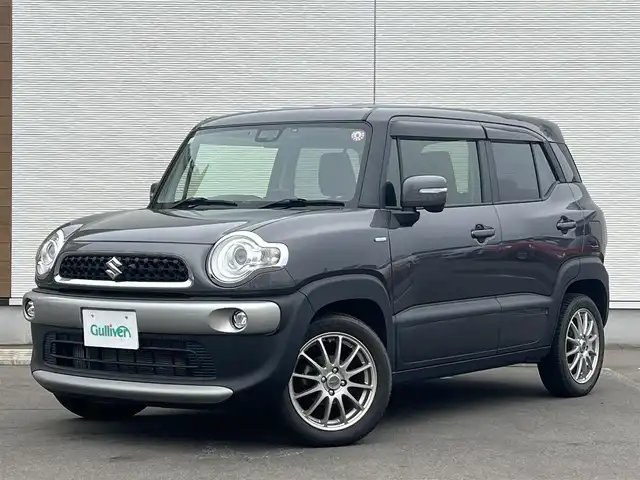 スズキ クロスビー HYBRID MZ 秋田県 2018(平30)年 2.7万km ミネラルグレーM 純正ナビ/衝突軽減システム/４WD/LEDヘッドライト/フルセグ/社外アルミ/スマートキー/ターボ/全方位カメラ/前席シートヒーター/クルーズコントロール/レーンキープアシスト/プッシュスタート/ドライブレコーダー/ダウンヒルアシストコントロール/アイドリングストップ/パーキングアシスト/パドルシフト/ETC/純正フロアマット/純正ドアバイザー/オートライト/オートエアコン/パワーステアリング/パワーウィンドウ/横滑り防止/盗難防止装置/電動格納ウィンカーミラー