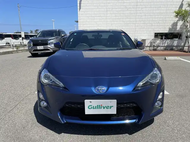 トヨタ ８６ GT 石川県 2013(平25)年 3.7万km ギャラクシーブルーシリカ 純正メモリーナビ/純正CD/DVD再生/フルセグTV/バックカメラ/LEDヘッドライト/スマートキー/プッシュスタート/電動ミラー/オートライト/純正アルミホイール/オートエアコン/社外マフラー