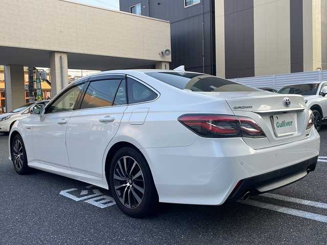 トヨタ クラウン ハイブリッド S Cパッケージ 広島県 2019(令1)年 7.7万km ホワイトパールクリスタルシャイン 登録時走行距離：76155km/メーカー純正ナビ/　CD DVD BT MSV フルセグTV/バックカメラ/プリクラッシュセーフティシステム/レーンキープアシスト/レーダークルーズコントロール/ブラインドスポットモニター/クリアランスソナー/ヘッドアップディスプレイ/リアクロストラフィックアラート/パーキングサポート/ロードサインアシスト/純正ドライブレコーダー/ビルトインETC/AC100V充電/MTモード付AT/ホールド機能付き電子パーキングブレーキ/パワーシート/シートヒーター/革巻きステアリング/ステアリングスイッチ/ステアリングヒーター/プッシュスタート/スマートキー