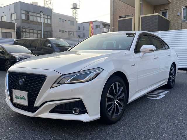 トヨタ クラウン ハイブリッド S Cパッケージ 広島県 2019(令1)年 7.7万km ホワイトパールクリスタルシャイン 登録時走行距離：76155km/メーカー純正ナビ/　CD DVD BT MSV フルセグTV/バックカメラ/プリクラッシュセーフティシステム/レーンキープアシスト/レーダークルーズコントロール/ブラインドスポットモニター/クリアランスソナー/ヘッドアップディスプレイ/リアクロストラフィックアラート/パーキングサポート/ロードサインアシスト/純正ドライブレコーダー/ビルトインETC/AC100V充電/MTモード付AT/ホールド機能付き電子パーキングブレーキ/パワーシート/シートヒーター/革巻きステアリング/ステアリングスイッチ/ステアリングヒーター/プッシュスタート/スマートキー