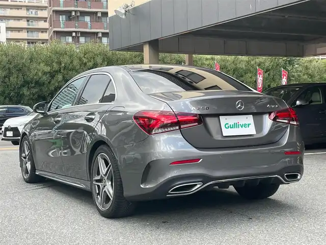 メルセデス・ベンツ Ｍ・ベンツ Ａ２５０ 4MATIC AMGライン 神奈川県 2020(令2)年 3万km マウンテングレー 新車時保証書　	取扱説明書　	/純正HDDナビ/フルセグTV			/バックカメラ　ETC【DSRC】		/ハーフレザーシート/シートヒーター		/フロントメモリー付パワーシート	/サンルーフ	/スマートキー×2本	/コーナーセンサー/道路標識アシスト/アクティブレーンキープアシスト/アクティブブレーキアシスト/アテンションアシスト/ブラインドスポットアシスト/レーンチェンジアシスト		/LEDヘッドライト/オートライト		/パドルシフト付皮巻きハンドル		/純正18インチアルミ