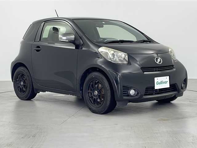 トヨタ ｉＱ 130G MT 岐阜県 2012(平24)年 8.4万km ブラックマイカ 社外ナビ/（BT/フルセグTV/CD/DVD）/バックカメラ/革ステアリング/ステアリングスイッチ/リモコンキー/スペアキー/純正フロアマット/電動格納ミラー/オートライト/アイドリングストップ/横滑り防止装置/保証書/取扱説明書