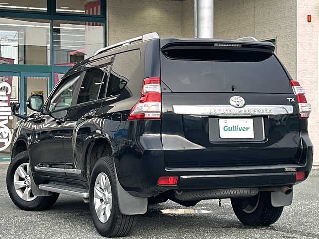 トヨタ ランドクルーザー プラド TX Lパッケージ 愛知県 2014(平26)年 10.1万km ブラック ワンオーナー/禁煙車/社外メモリナビ/　AM/FM/BT/CD/DVD/フルセグTV/前席パワーシート/前席シートヒーター/クルーズコントロール/革巻きステアリング/三列目電動格納シート/オートライト/LEDヘッドライト/フォグランプ/横滑り防止装置/純正フロアマット/W＋カーテンエアバッグ/取説/保証書/スペアキー