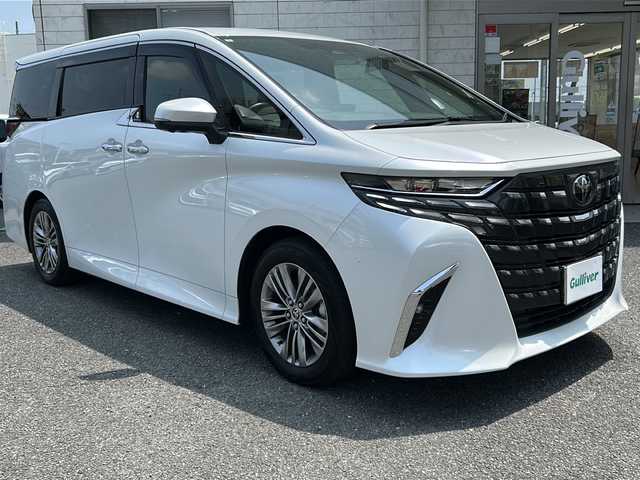 トヨタ アルファードハイブリット Z 埼玉県 2024(令6)年 0.8万km プラチナホワイトパールマイカ ワンオーナー　/ツインルーフ　/純正フリップダウンモニター　/純正ディスプレイオーディオ　/フルセグ/BT/USB/HDMI/AM/FM/デジタルインナーミラー　/ユニバーサルステップ　/全周囲カメラ　/前後ドライブレコーダー　/オートホールド/電動パーキング/ACC/オートライト/オートハイビーム/パワーバックドア/運転席メモリーシート/前・2列目パワーシート/前・2列目シートヒーター/前・2列目エアーシート/ハンドルヒーター/パドルシフト/BSM/LKA/PKSB/クリアランスソナー/LSA/パーキングアシスト/ビルトインETC/置くだけ充電/スマートキー2本　/保証書
