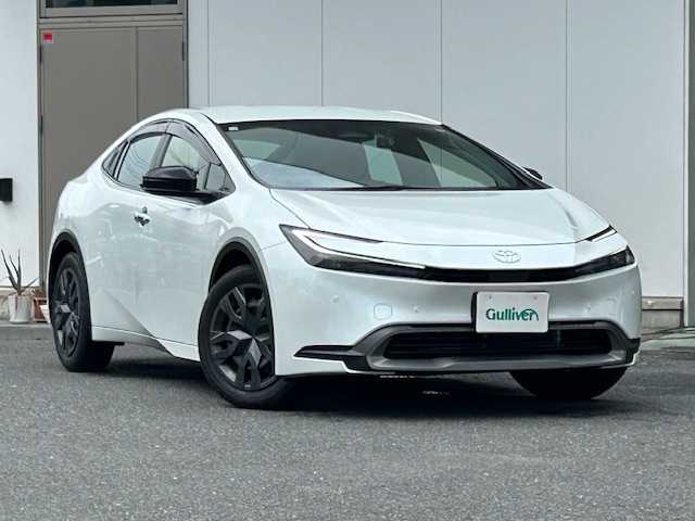 トヨタ プリウス G 宮城県 2023(令5)年 1.3万km プラチナホワイトパールマイカ ワンオーナー/純正ナビ（AM/FM/BT/USB）/フルセグTV/レーダークルーズコントロール/レーンキープアシスト/衝突被害軽減装置/コーナーセンサー/シートヒーター/電動パーキングブレーキ/オートライト/オートマチックハイビーム/LEDライト/ETC2.0/ドライブレコーダー（前後）/保証書