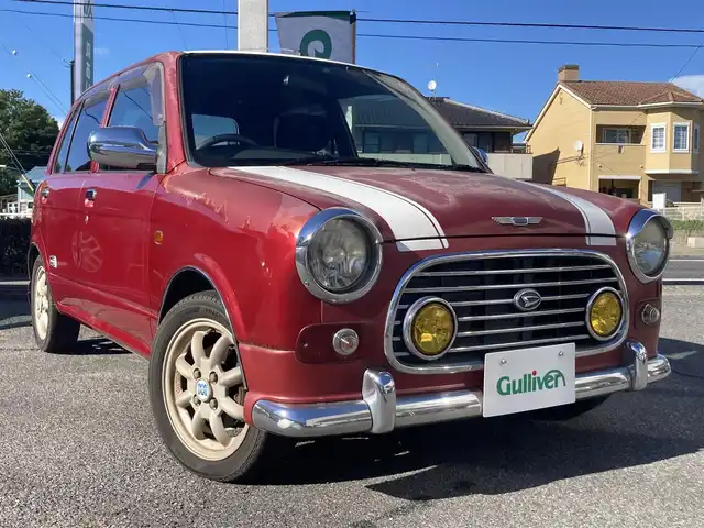 ダイハツ ミラ ジーノ ミニライトSP ターボ 愛知県 2002(平14)年 8万km レッドマイカメタリック ターボ車/キーレスエントリー/ルーフ色塗り(白系)/キセノンヘッドライト/純正アルミホイル/車検　令和9年8月
