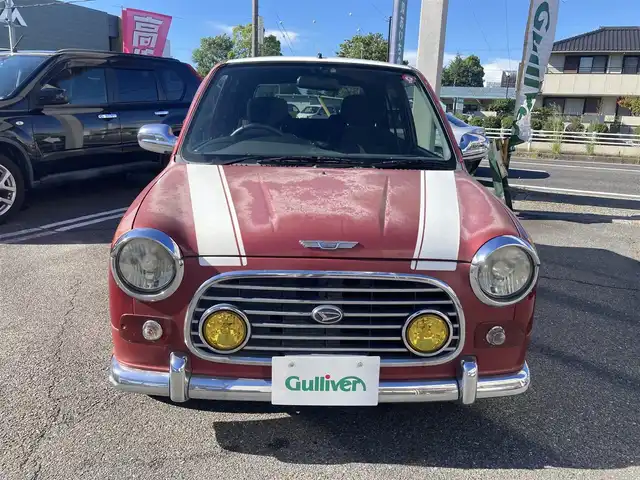 ダイハツ ミラ ジーノ ミニライトSP ターボ 愛知県 2002(平14)年 8万km レッドマイカメタリック ターボ車/キーレスエントリー/ルーフ色塗り(白系)/キセノンヘッドライト/純正アルミホイル/車検　令和9年8月