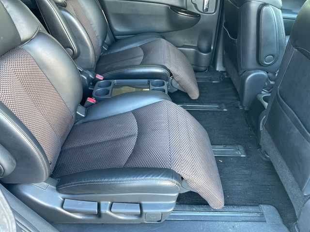 日産 エルグランド 250ハイウェイスター 静岡県 2011(平23)年 8.9万km ブリリアントホワイトパール 社外ナビ　/社外フリップダウンモニター　/両側パワスラ　/半革シート　/革巻きステアリング　/オートライト　/ウィンカーミラー　/木目調パネル/ETC　/純正１８インチＡＷ　/スマートキー　/スペアキー　/保証書　/取説